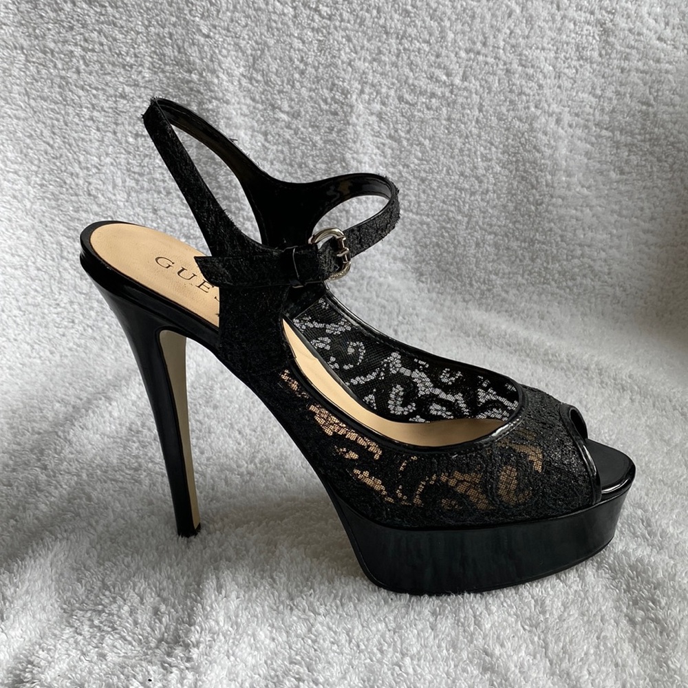 Guess black peep toe pump with ankle strap. Size 9.